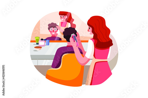 A woman barber doing haircut