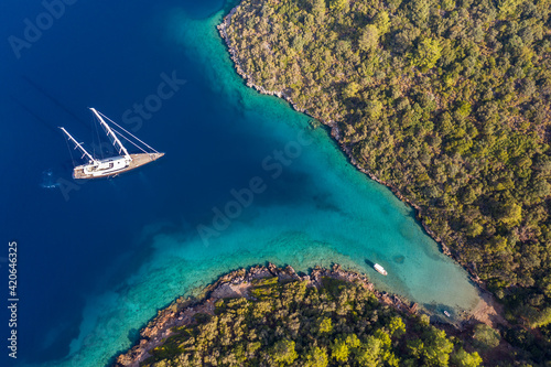 aerial view of an manoeuvring sailboat photo