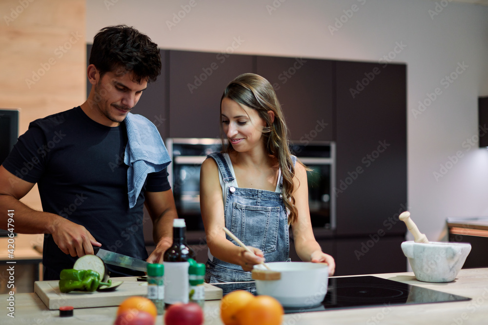 Couple cooking at home Couple cooking at home
