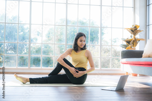 Free Download woman working yoga at home, young female person workout exercise training sport indoor at home, learning with digital cyber device online fitness trainer, healthy active  lifestyle - GFXLoad