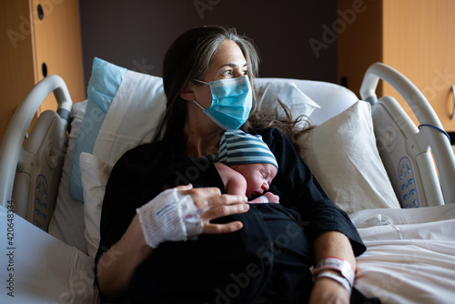 Mother and Baby in Maternity Ward during COVID-19 photo