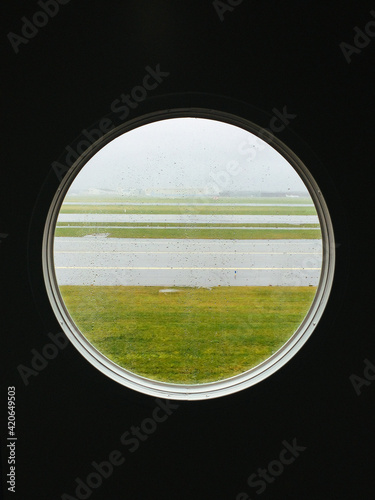 View out of a circular airplane window