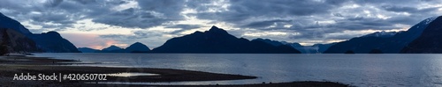 Beautiful Panoramic View of Canadian Mountain Landscape on the Pacific Ocean Coast. Winter Sunset Sky. Howe Sound between Squamish and Vancouver, British Columbia, Canada. Nature Background Panorama.