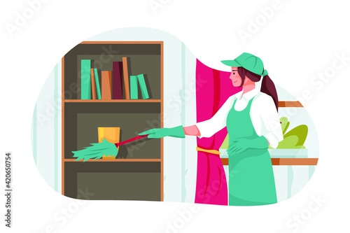 Cleaning worker cleans the office with feather brush. 