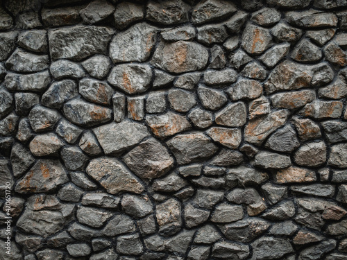 Texture of old stone brick wall in city