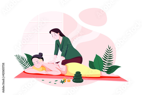 Woman making massage for a young lady. Spa procedure in beauty salon interior. Back treatment and relaxation. 