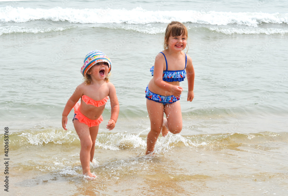 caucasian child on the beach in summer vacation lifestyle caucasian child on the beach in summer vacation lifestyle