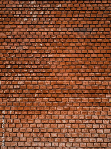 Texture of red brick wall in the city