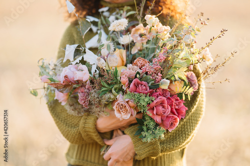 Woman holding bouquet photo
