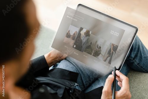 Man using digital tablet with stylus
