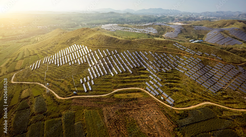 Solar photovoltaic base built by aerial photography mountain
