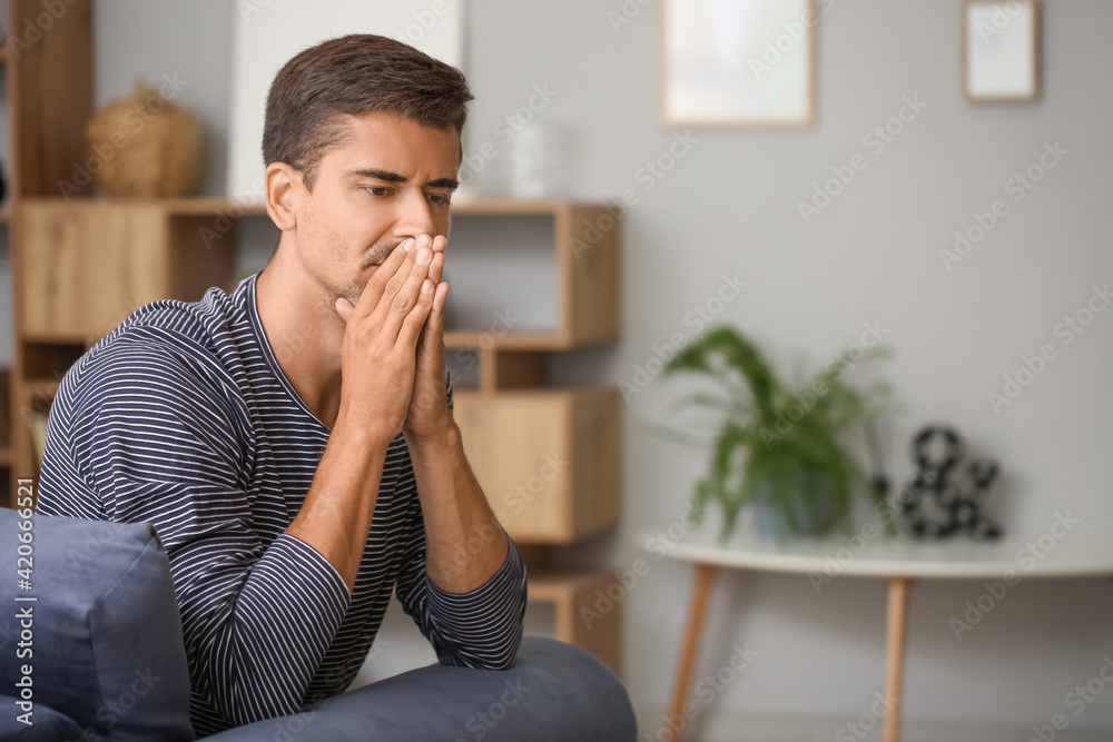 Portrait of stressed young man at home Portrait of stressed young man at home