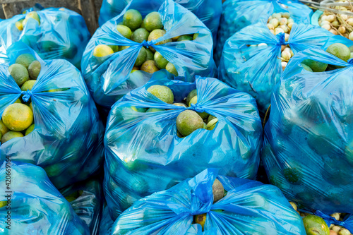 fresh Fruit inside a plast bags on sale in a street market photo