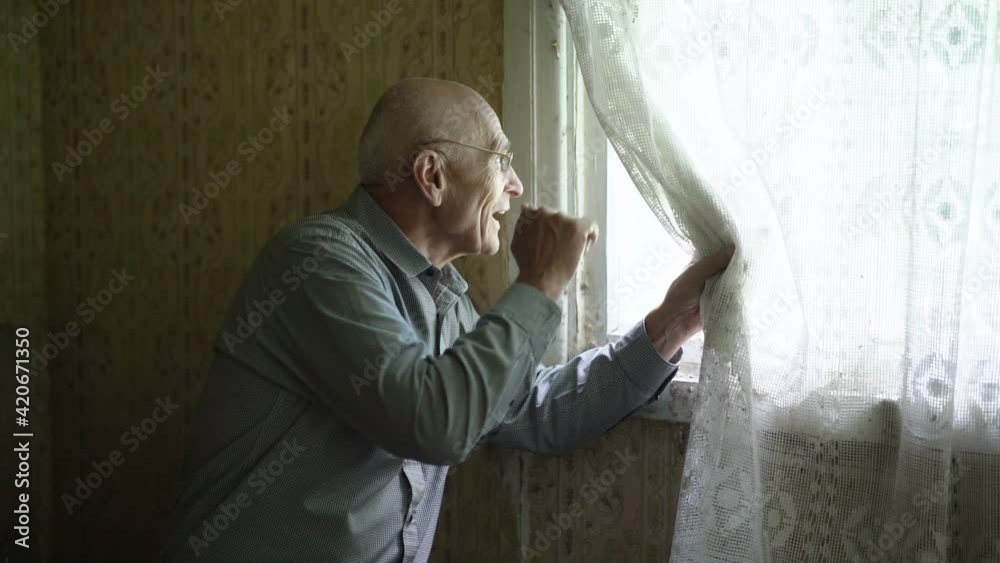 Vulnerable senior man on self isolation is communication with people