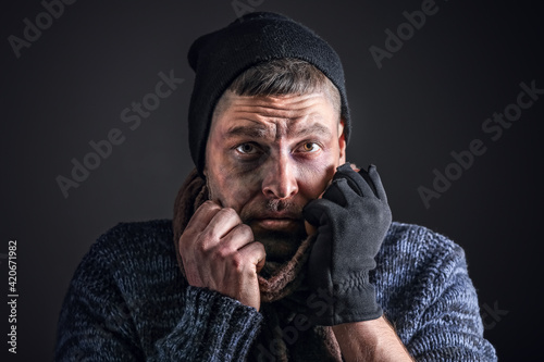 Portrait of poor homeless m...