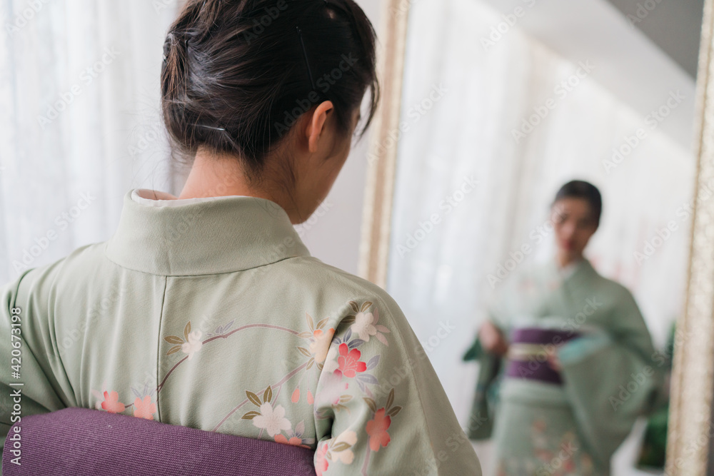portrait of Asian woman wearing kimono portrait of Asian woman wearing kimono