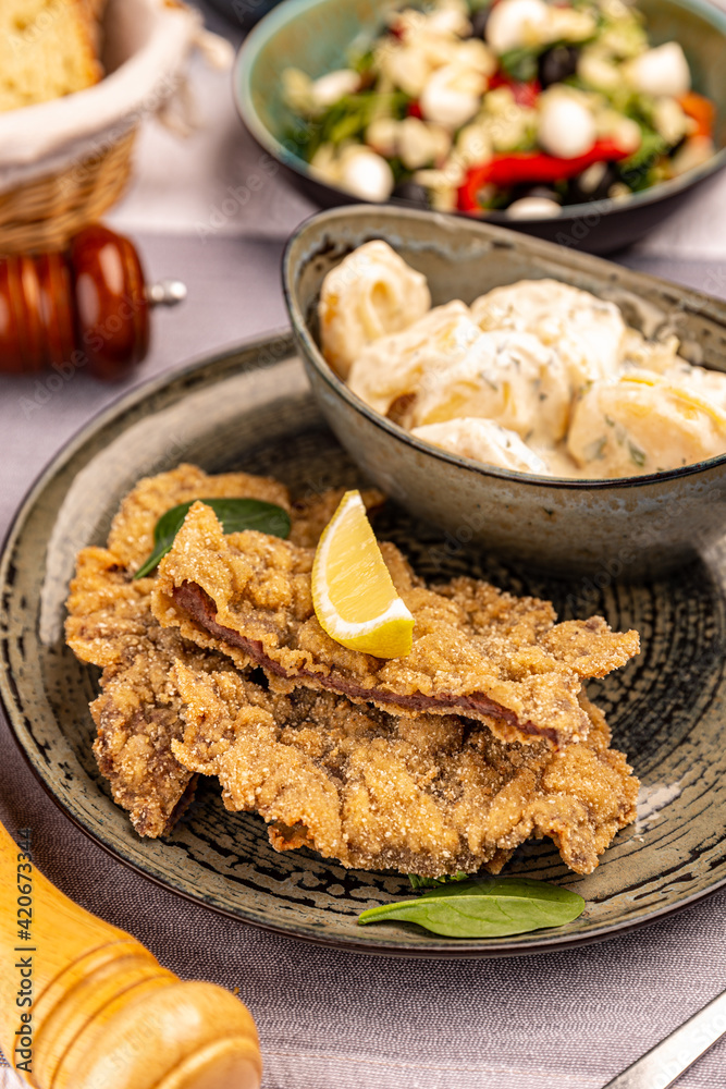 Schnitzel with potato salad Schnitzel with potato salad
