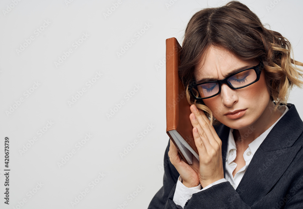 Business woman classic suit book bound finance model Business woman classic suit book bound finance model