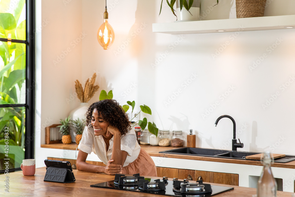 Woman on a video call talking with her mom Woman on a video call talking with her mom