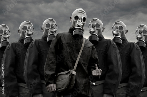 A group of soldiers in gas masks photo