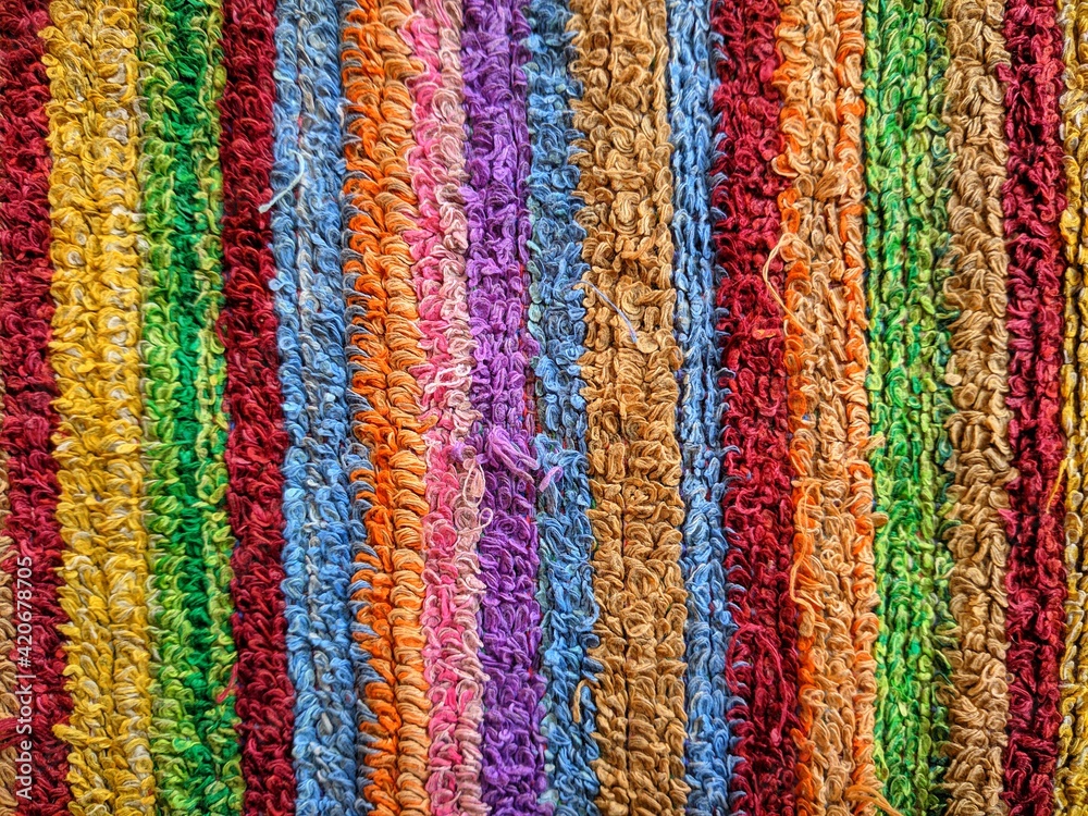 a cloth with a bright colorful pattern photographed during the day