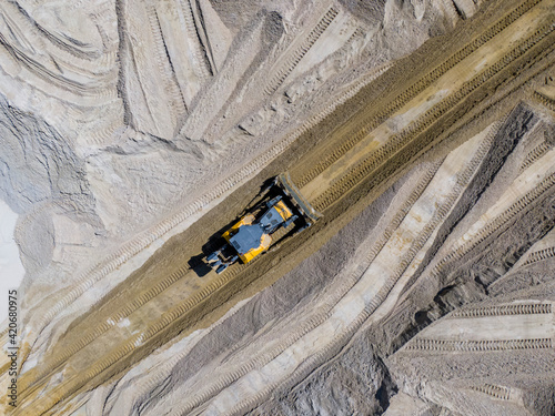 Aerial view of a bulldozer in a quarry photo