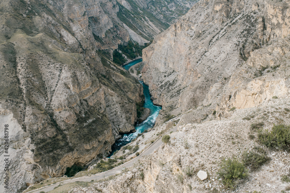 Aerial view on canyon with blue river Aerial view on canyon with blue river