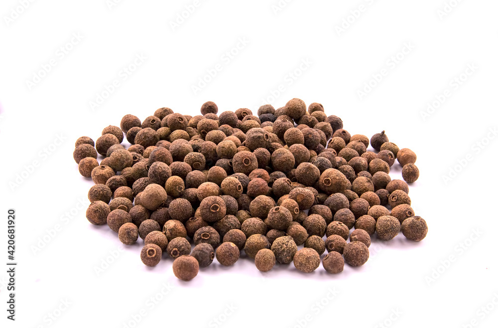 Pile of allspice isolated on white background. Pile of allspice isolated on white background.