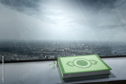 Canvas Print Quran besides the window with cityscapes