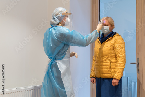 Vaccination Procedure In Protective Clothing