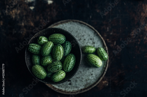 Tiny cucamelons in bowls photo