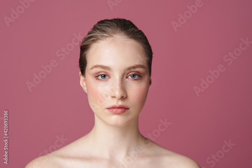 Portrait of beautiful young woman isolated