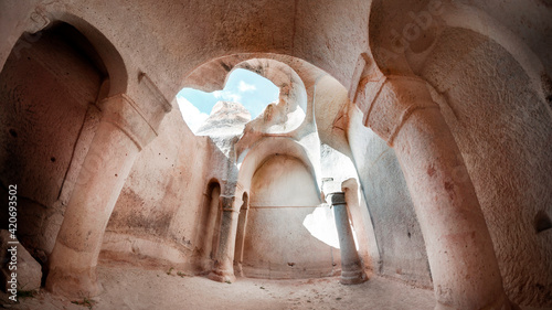 CAPPADOCIA, Ortahisar, Turkey. Hallach monastery. The interior of an ancient church with a ruined dome. photo