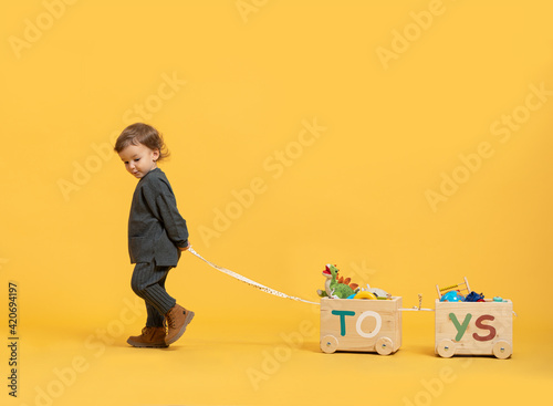 Little Boy Playing With Toys photo