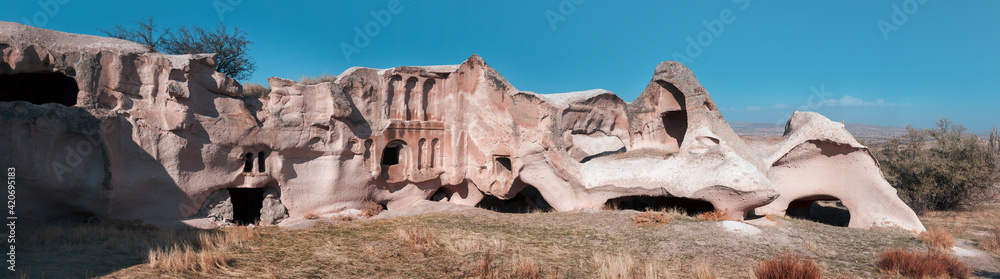 Turkey Achiksaray, suburb of Nevsehir. Ancient ruins of churches carved into sandy rocks. Cappadocia, Turkey Turkey Achiksaray, suburb of Nevsehir. Ancient ruins of churches carved into sandy rocks. Cappadocia, Turkey
