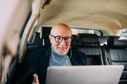 A Successful Businessman in a Car photo