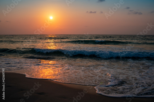 Colorful vibrant ocean sea wave beach summer with sunrise or sunset background landscape on vacation.