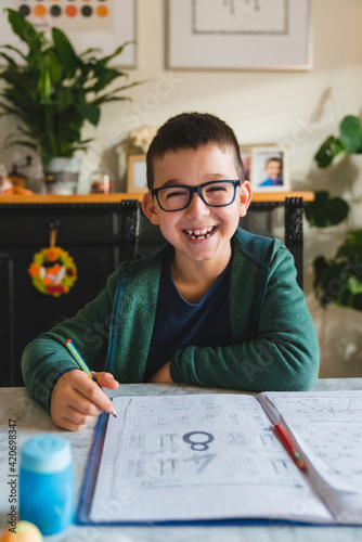 Joyful Child doing Homework