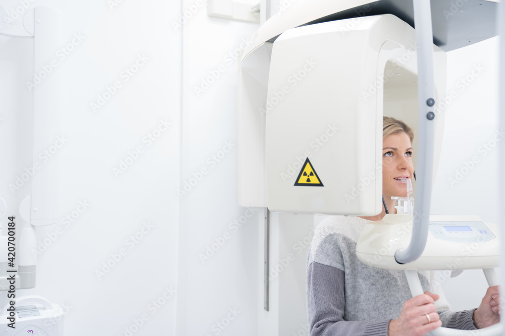 Woman Doing Dental X-Ray Woman Doing Dental X-Ray