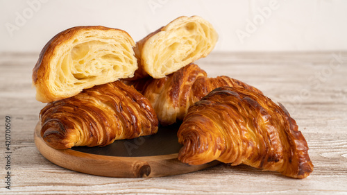 Background for french croissants. French croissants isolated. Fresh tasty croissants as background