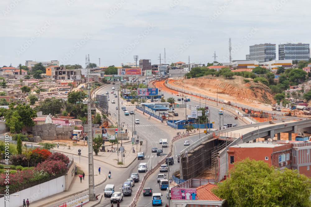 Aerial view at the samba road in the Luanda city downtown center with road, vehicles and buildings