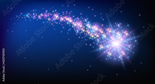 Flying sparkling comet with curved glowing dust tail  in the starry night sky. Star dust trail with shining stars. Space research concept.