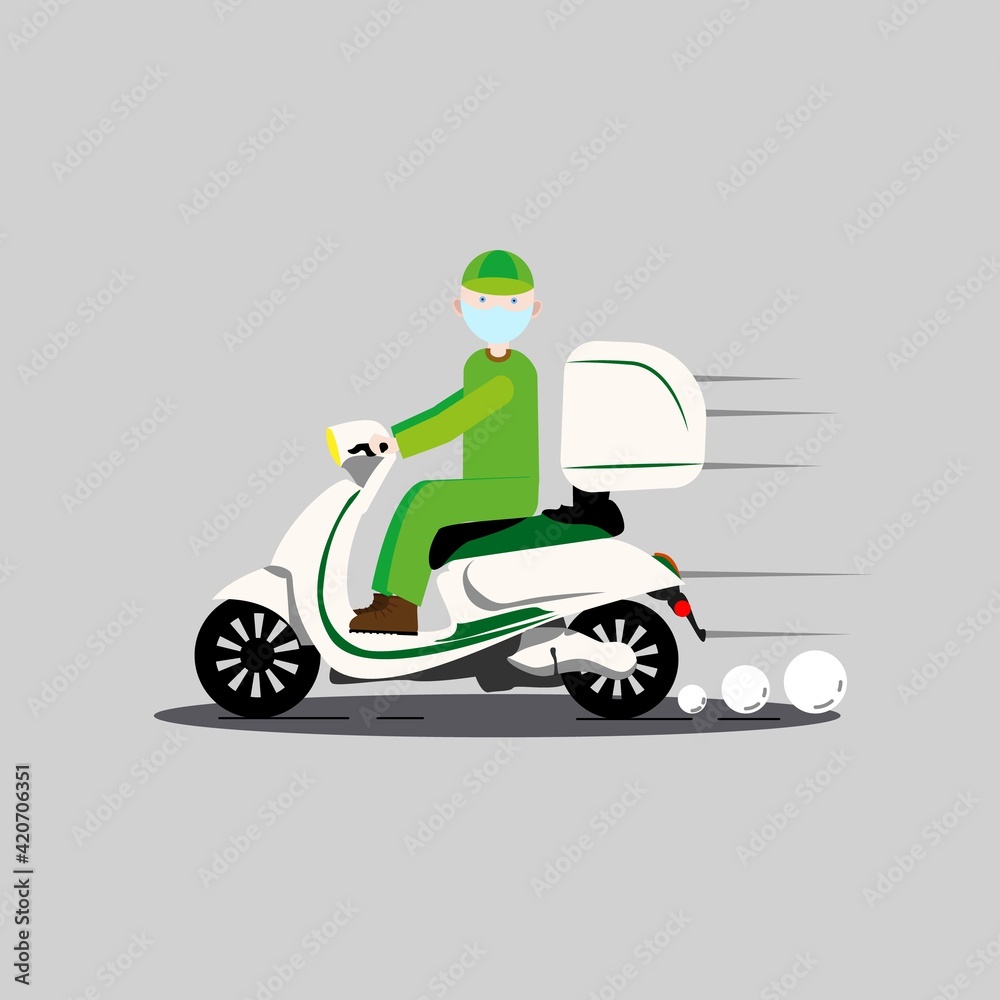 A courier in a green suit and a medical mask on a scooter A courier in a green suit and a medical mask on a scooter