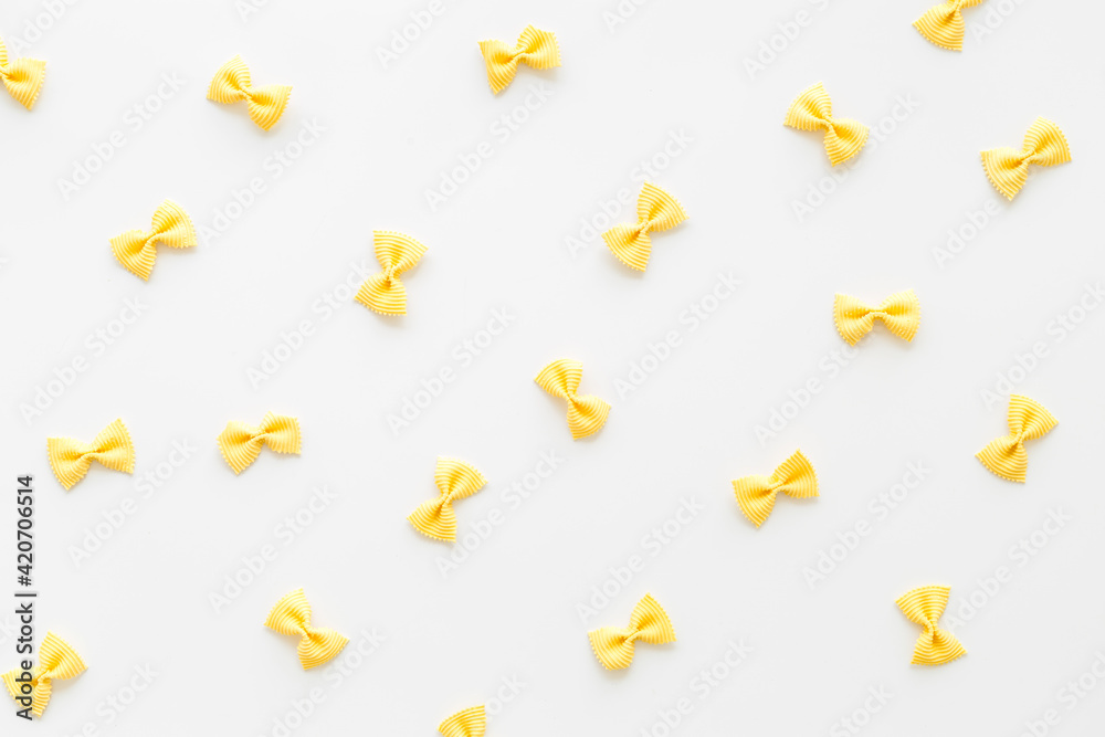 Italian colorful pasta pattern, top view. Various vegan farfalle pasta Italian colorful pasta pattern, top view. Various vegan farfalle pasta