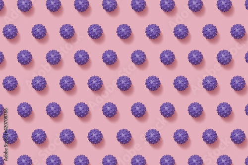 Horizontal pattern from purple spiky balls toys. photo