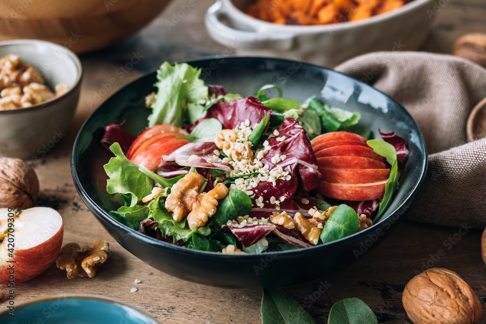 Fresh salad with apples amnd sweet potatoes