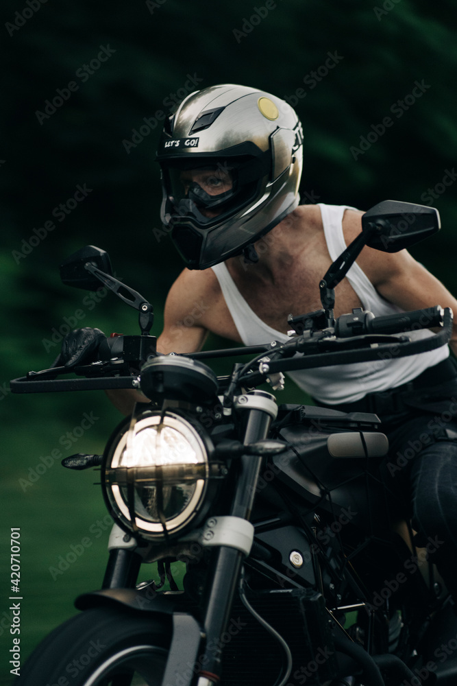 Portrait Of An Anonymous Motorcyclist With Helmet Portrait Of An Anonymous Motorcyclist With Helmet