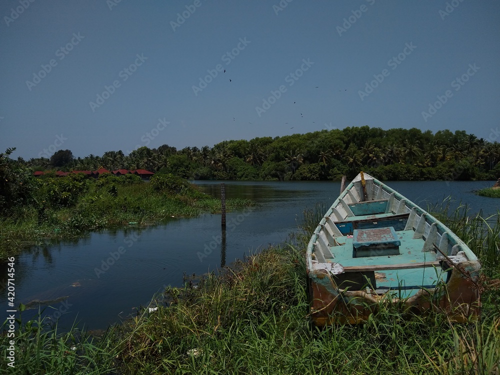 Broken boat on the river, Thiruvananthapuram Kerala