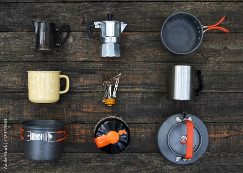 Set of camping cookware for cooking food.