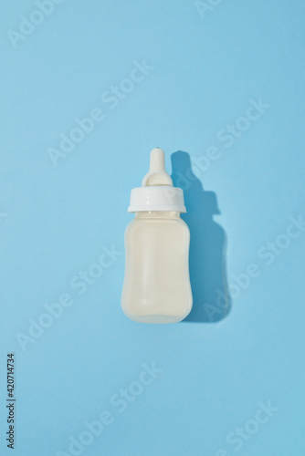 Baby bottle with breast milk for feeding.